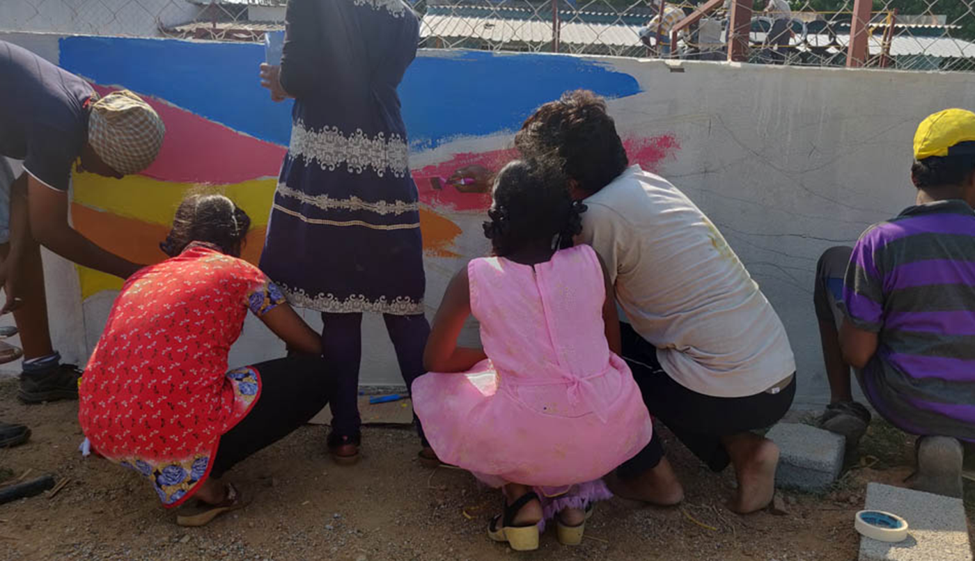 Students painting together